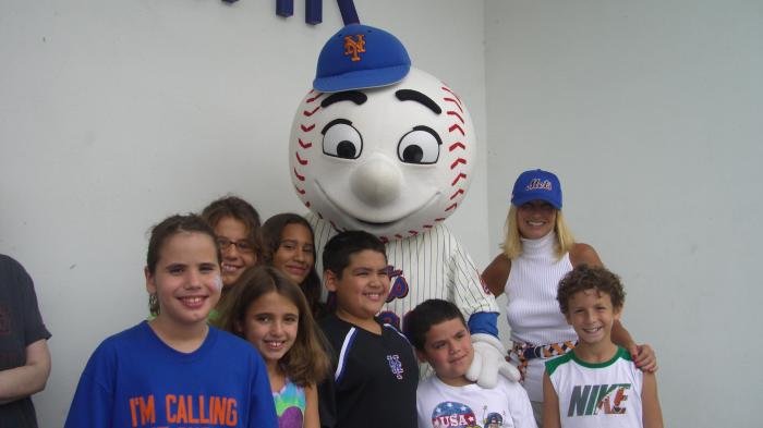 Mr. Met with KRVC's Executive Director Tracy Shelton and a Happy Group of KRVC Kids!